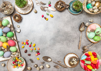 Easter table decoration eggs sweets copy space Flat lay