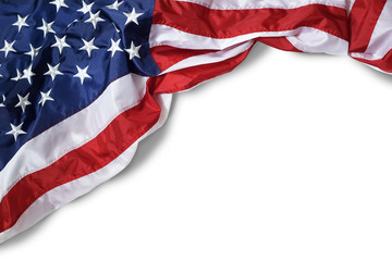 Fototapeta premium Closeup ruffled American flag isolated on white background