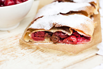 Strudel with a cherry. Cherry pie.