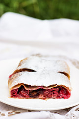 Strudel with a cherry. Cherry pie.