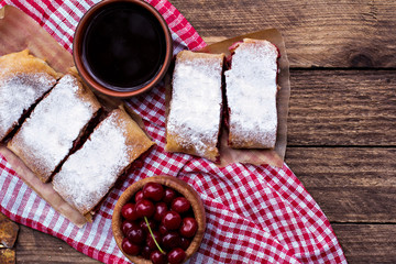 Strudel with a cherry. Cherry pie.