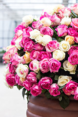 A huge bouquet of white and pink roses.