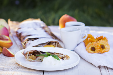 Strudel with peaches and apples
