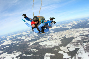 Skydiving. Tandem jump with pretty girl.