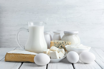Fresh dairy products and eggs on table