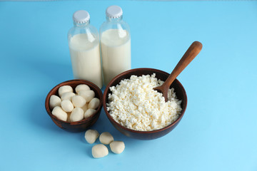 Fresh dairy products on color background