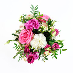 Composition of flowers in a pink hatbox. Tied with wide white ribbon and bow