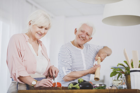 Senior Couple Preparing Healthy Meal