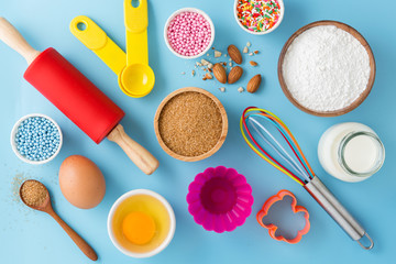 Fototapeta na wymiar Ingredients and kitchen tools for baking cake