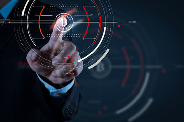 Fototapeta premium Businessman working with new modern computer and Bitcoin cryptocurry virtual diagram as concept.