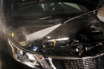 outdoor car wash with yellow sponge