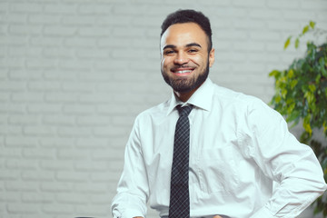 Handsome cheerful african american executive business man