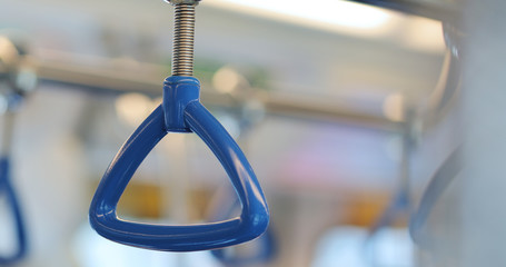 Hand rail inside train compartment