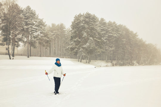Belarus, Grodno, Lake Molochnoe in the winter. People skiing.