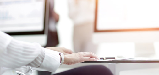 Fototapeta premium close-up of a work desk in a modern office. business concept.