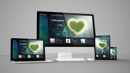 computer gadgets with travel website on screen