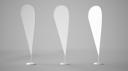 three advertising banner flags