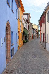 Fototapeta premium colorful old houses street Rimini Italy summer season
