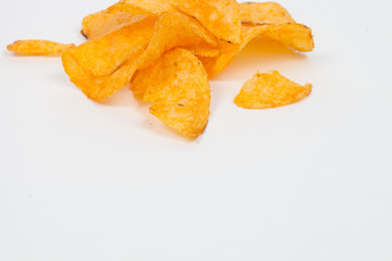 Fototapeta na wymiar Isolated golden crunchy chips