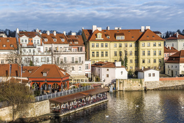 Fototapeta na wymiar Picturesque neighborhoods on the banks of the Vltava river