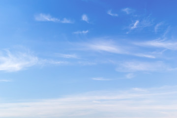 Blue sky with white windy clouds