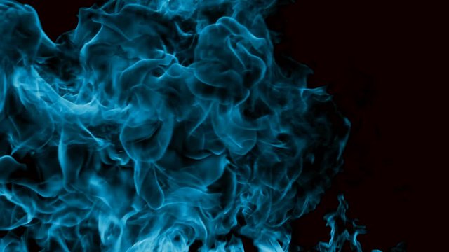 Blue fire explosion in slowmotion, shooting with high speed camera.