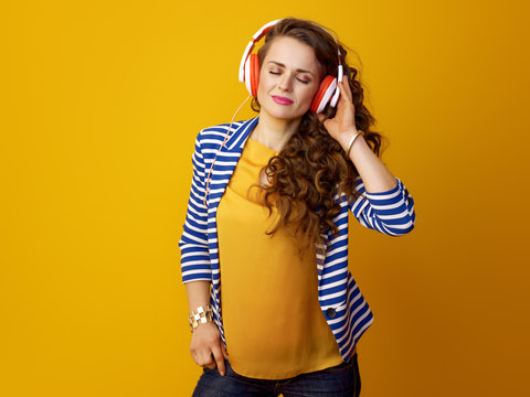 modern woman with headphones listening to music