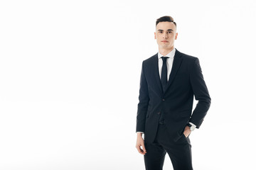 handsome businessman looking at camera isolated on white