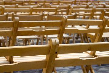 empty wooden chairs concert