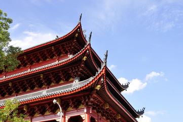 Naklejka premium Chinese style temple roof against blue sky background