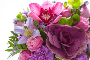 Bright buketny composition from fresh flowers, the white isolated background
