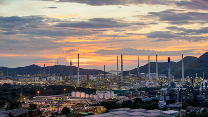 Beautiful sunset  petrochemical oil refinery factory plant cityscape of Chonburi province at night  , landscape Thailand