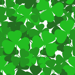 Fototapeta na wymiar Saint Patrick's day seamless background with green shamrock leaves.