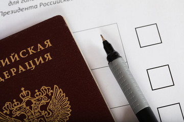 Russian passport on a approximate sample of ballot paper for presidential elections.
