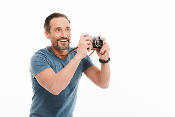 Portrait of a happy mature man dressed in t-shirt