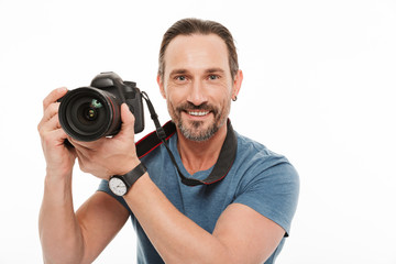 Portrait of a happy mature man dressed in t-shirt