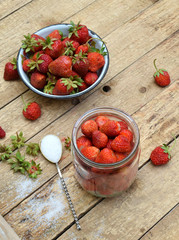 Organic fresh strawberry from garden. Preparation for making berry compote or jam. Homemade conservation for the winter. Raw food. Copy space.
