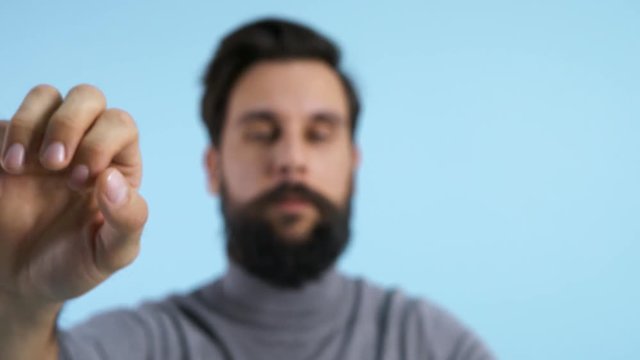 Defocused man using invisible touch screen 
