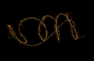 A flurry of sparkle on the black background.