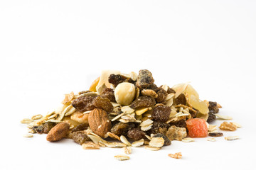 Muesli and dried fruit isolated on white background. 