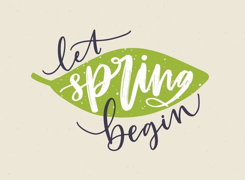 Let Spring Begin lettering written with calligraphic cursive font and decorated by fresh green leaf