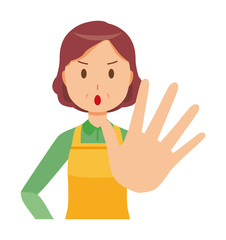 A middle-aged housewife wearing an apron is stop gesture
