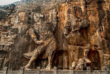 LUOYANG, CHINA - OCTOBER 28: Visitors at Longmen grottoes on October 28, 2007.It is one of the four notable grottoes in Luoyang,Henan,China . A UNESCO World Heritage Site.