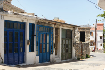 A typical street in a Greek village. Old houses
