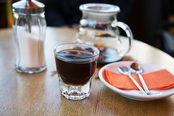 cup of coffee on the table in the cafeteria