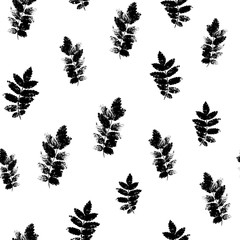 Vector green leaves on white background. Seamless pattern