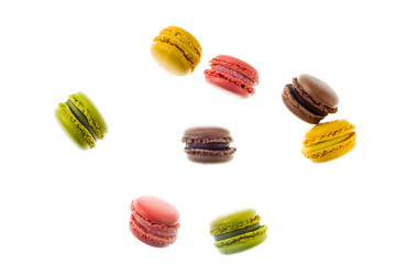 colorful traditional French sweets macaroons from almond flour isolated on white.