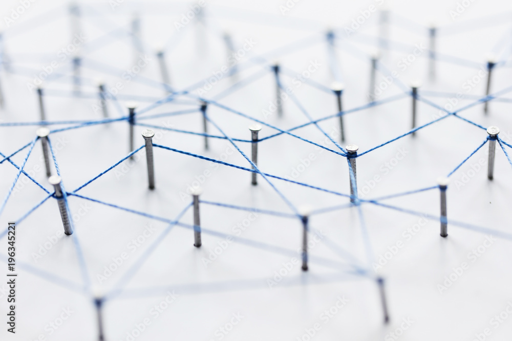 Poster a large grid of pins connected with string. communication, technology, network concept