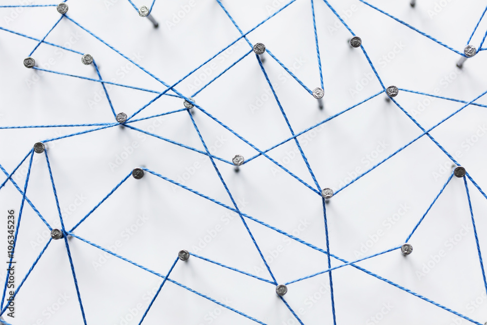 Poster a large grid of pins connected with string. communication, technology, network concept