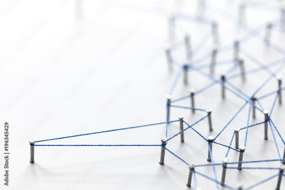 Poster a large grid of pins connected with string. communication, technology, network concept